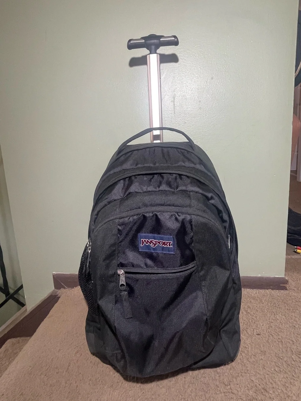 Jansport Black Rolling Backpack with Telescopic Handle